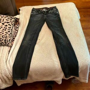 Faded black low waisted and boot cut.